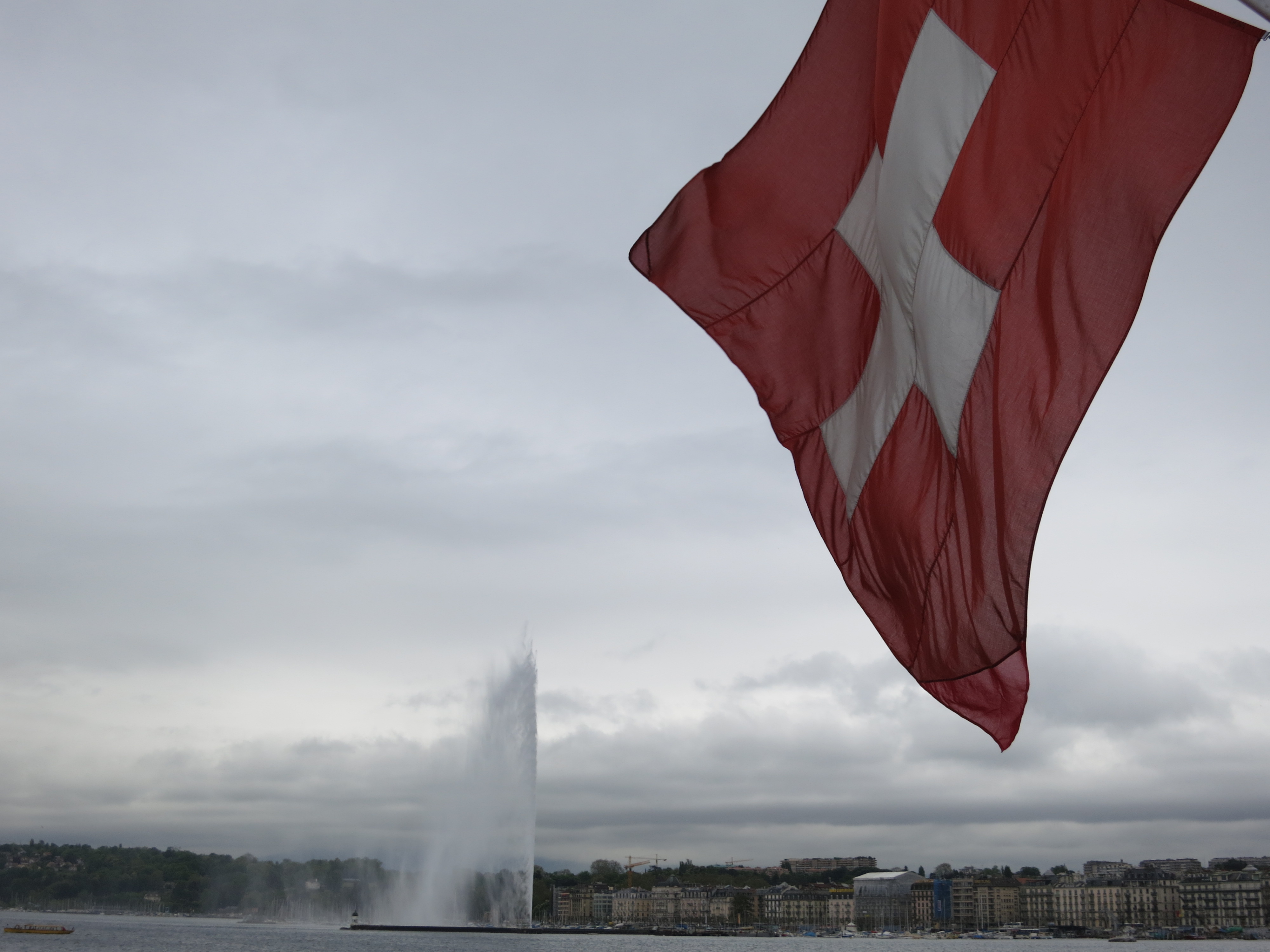 Katie's photography skills. Swiss flag with Jet d'Eau in background.